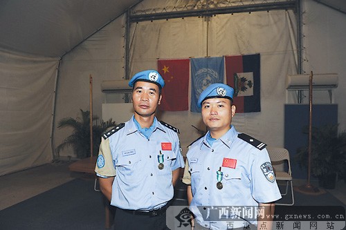 周基东(右)和胡小平(左) 周基东(右)和胡小平(左)