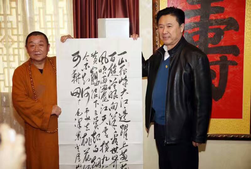 与佛教文化大师释延滔先生在活动中 与佛教文化大师释延滔先生在活动中