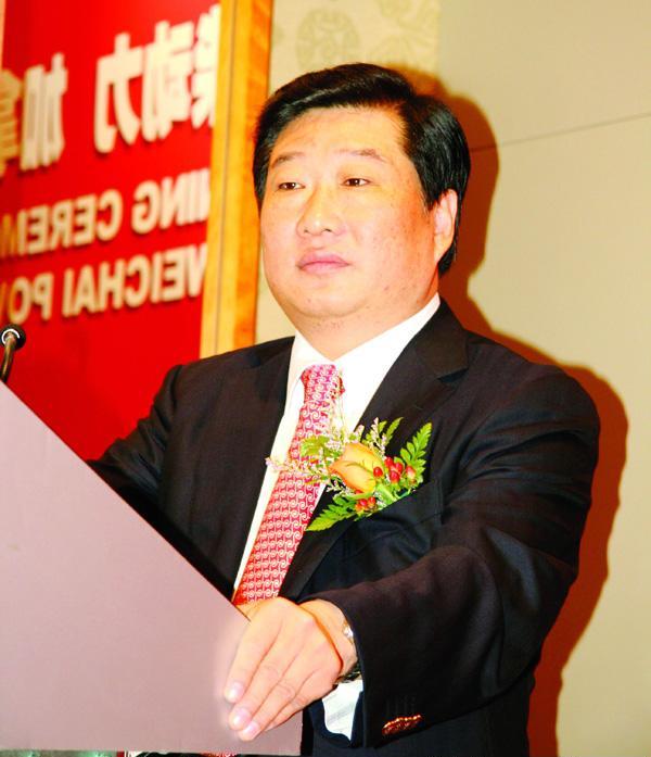 公司董事长——谭旭光 公司董事长——谭旭光